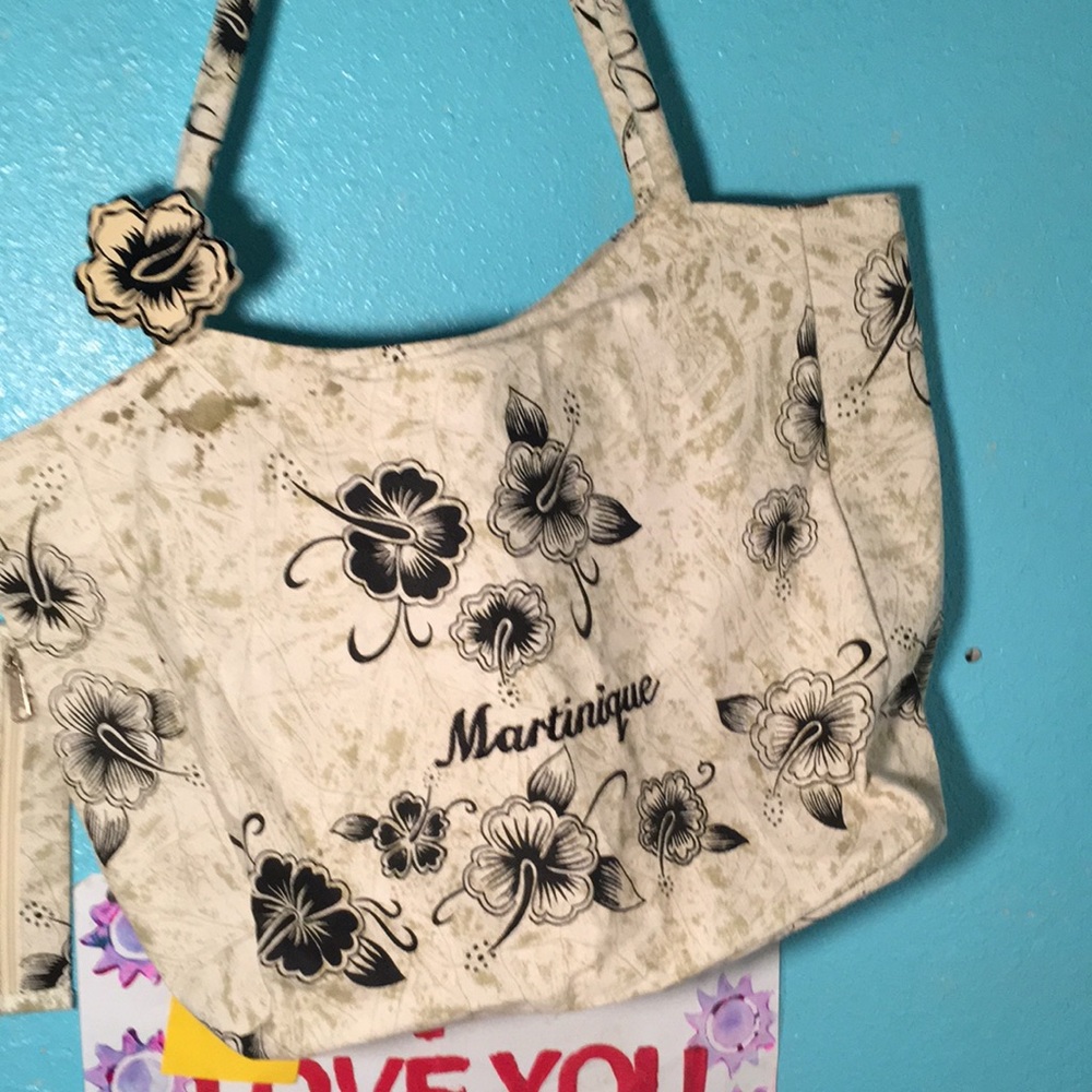 Large shoulder bag with a small bag